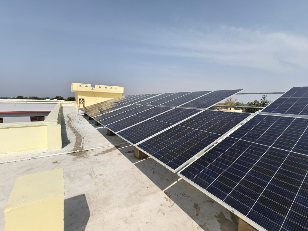 Rooftop solar installation on flat concrete roof